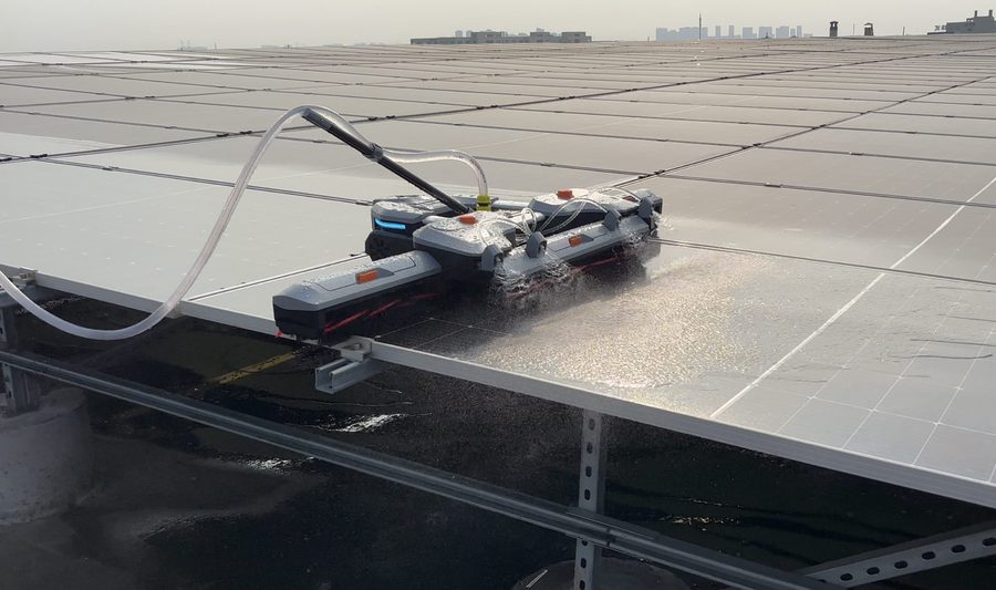 IFBOT M20 washing a large flat solar array